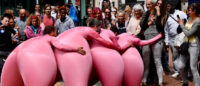 4 guys in Pink Jump Suits!